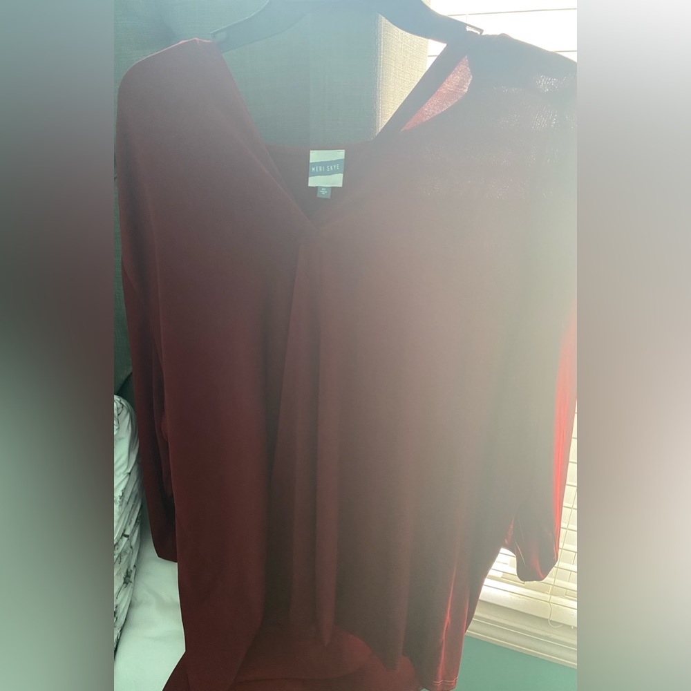 I am selling a blouse the size is a 4x